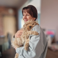 Photo of Niki and her grand-puppy Otis